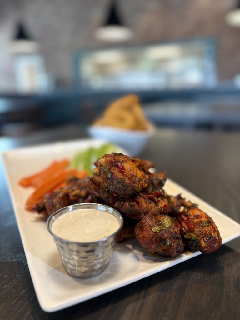 Calabrian chili chimichurri wings with ranch at Simple EJ's sports restaurant in St. Charles IL
